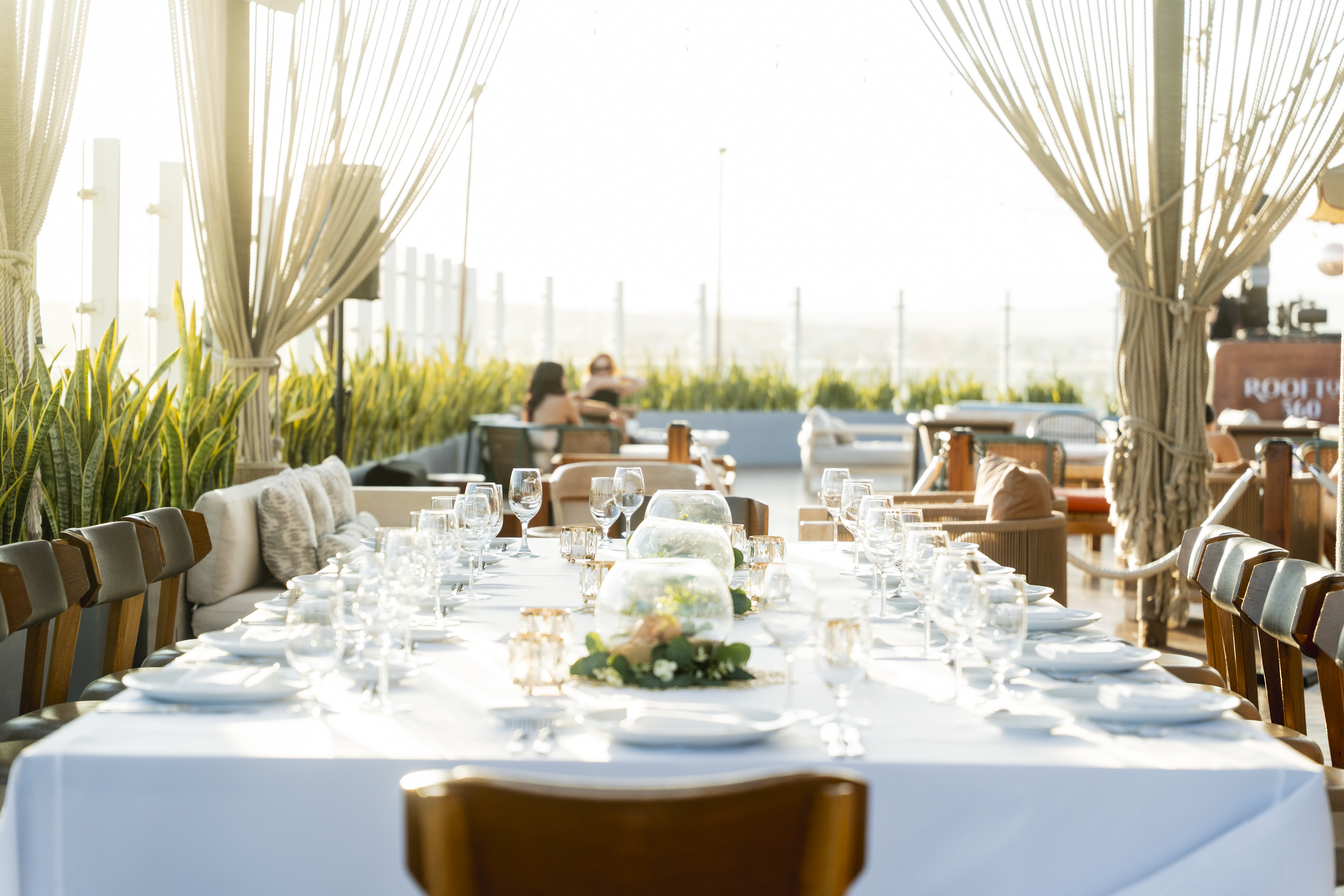 Long table set for dinner at Rooftop 360